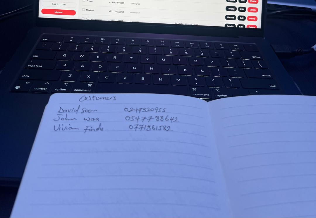 Business owner reviewing customer data on a laptop